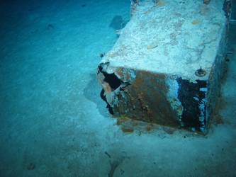 Rectangular tank or locker on seabed